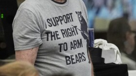 A man waits his turn to speak at a Florida Fish and Wildlife Commission hearing about proposed bear hunting in May 2025 in Ocala. The hunt began Dec. 6 and ended Sunday, Dec. 28, 2025.