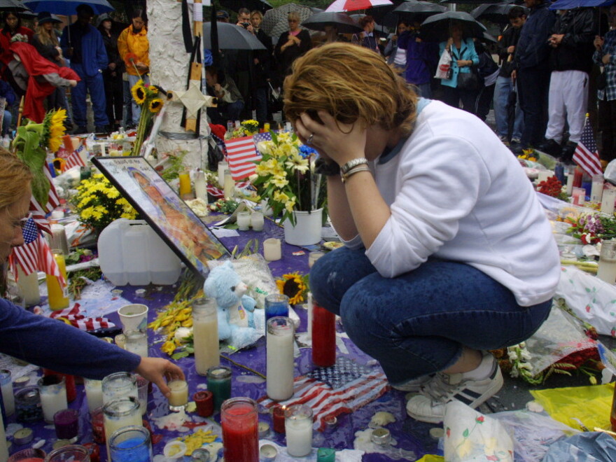 Toni Ann Costa mourns the victims of the World Trade Center disaster on Sept. 14, 2001.