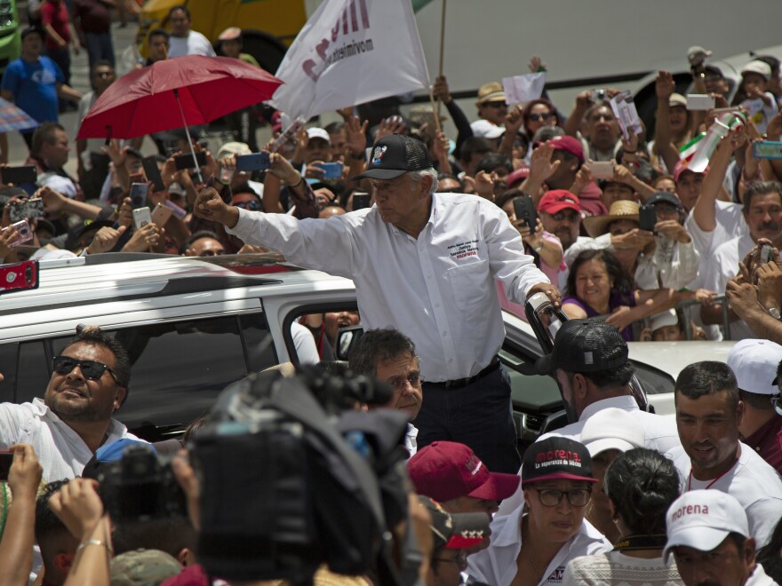 López Obrador gestures to supporters as he ends his campaign rally in Mexico City on June 3.