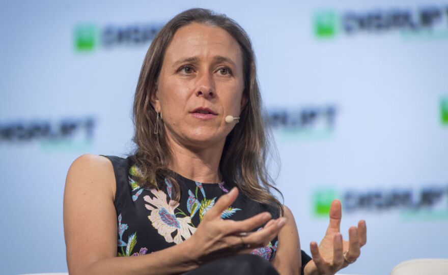 Anne Wojcicki, chief executive officer and co-founder of 23andMe, speaks during the TechCrunch Disrupt 2018 summit in San Francisco in September 2018.