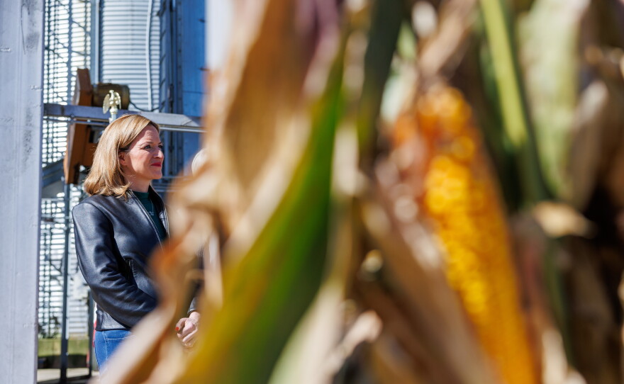 Secretary of State Jocelyn Benson, the Democratic nominee for governor, stands with corn growers during a news conference at Shady Lodge Farm in Lansing, Mich., on Oct. 8, 2026.
