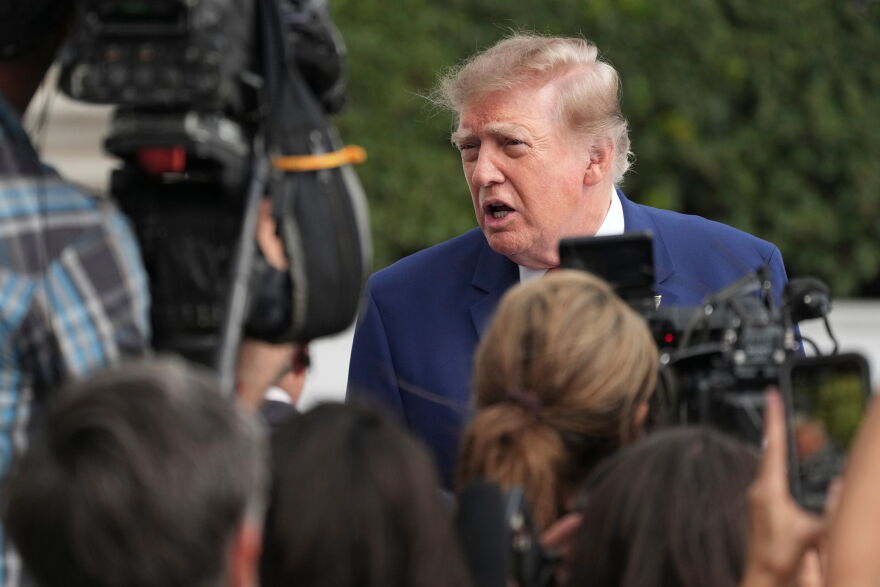 President Donald Trump speaks to reporters on the South Lawn of the White House, Friday, Oct. 16, 2026, in Washington.