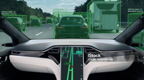 Self driving car on a road. Autonomous vehicle. Inside view.