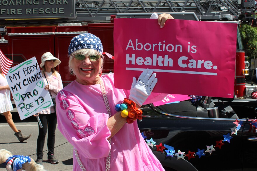  Citizens marching in support of Planned Parenthood during Aspen's Fourth of July parade on July 4, 2022. 