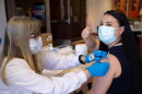 Dr. Iulia Vann receiving a COVID-19 vaccine in 2021. Photo courtesy of the Guilford County Division of Public Health