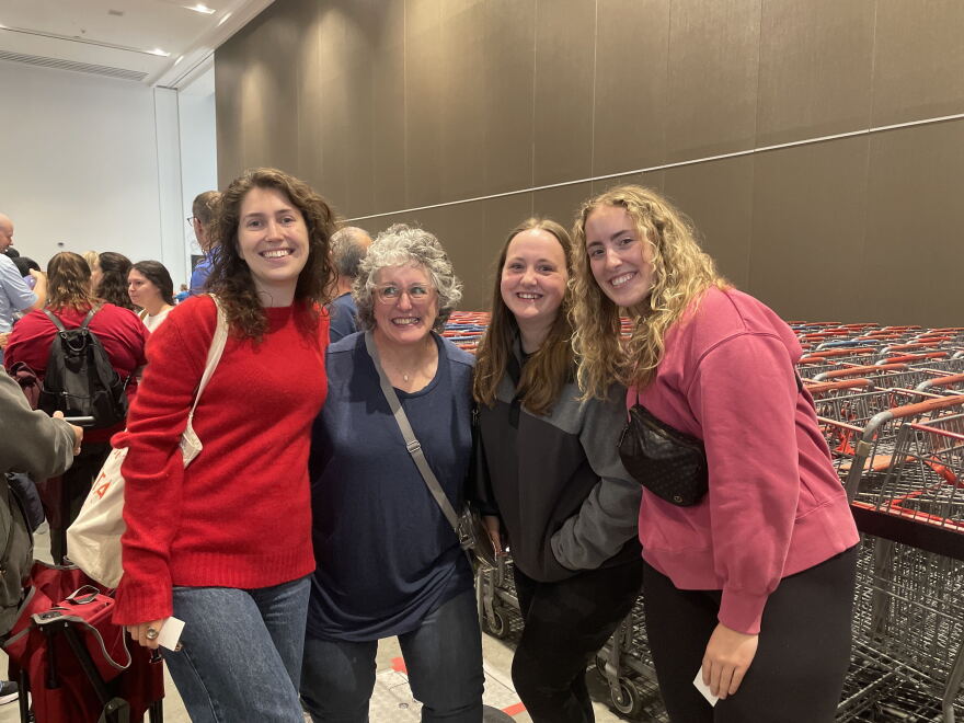 Isabella Norante, far left, with strangers she met waiting in line for the Le Creuset Factory-to-Table sale in Milwaukee on Oct. 1, 2026.