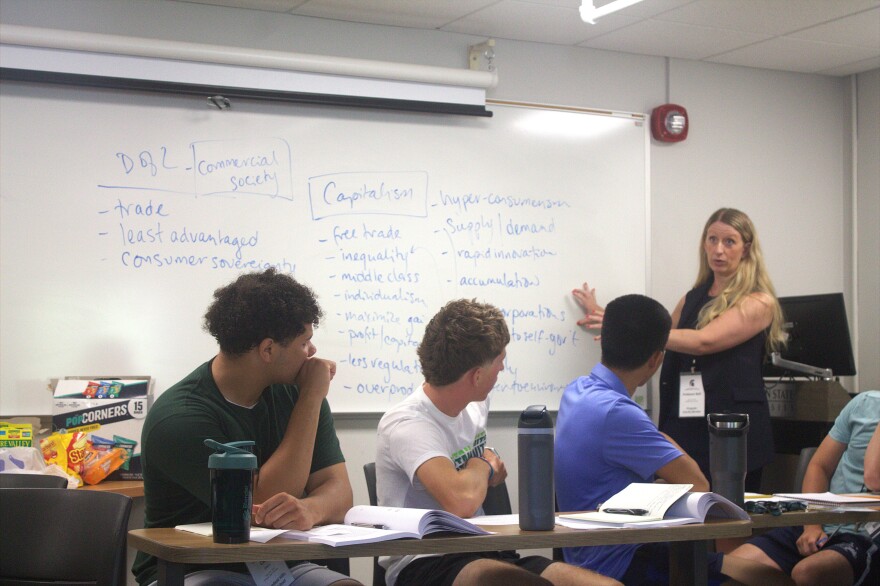 MSU professor Brianne Wolfe teaches Capitalism lecture to group of high school students during the Civics Education Academy, hosted by Michigan State University's James Madison College on July 15, 2026.