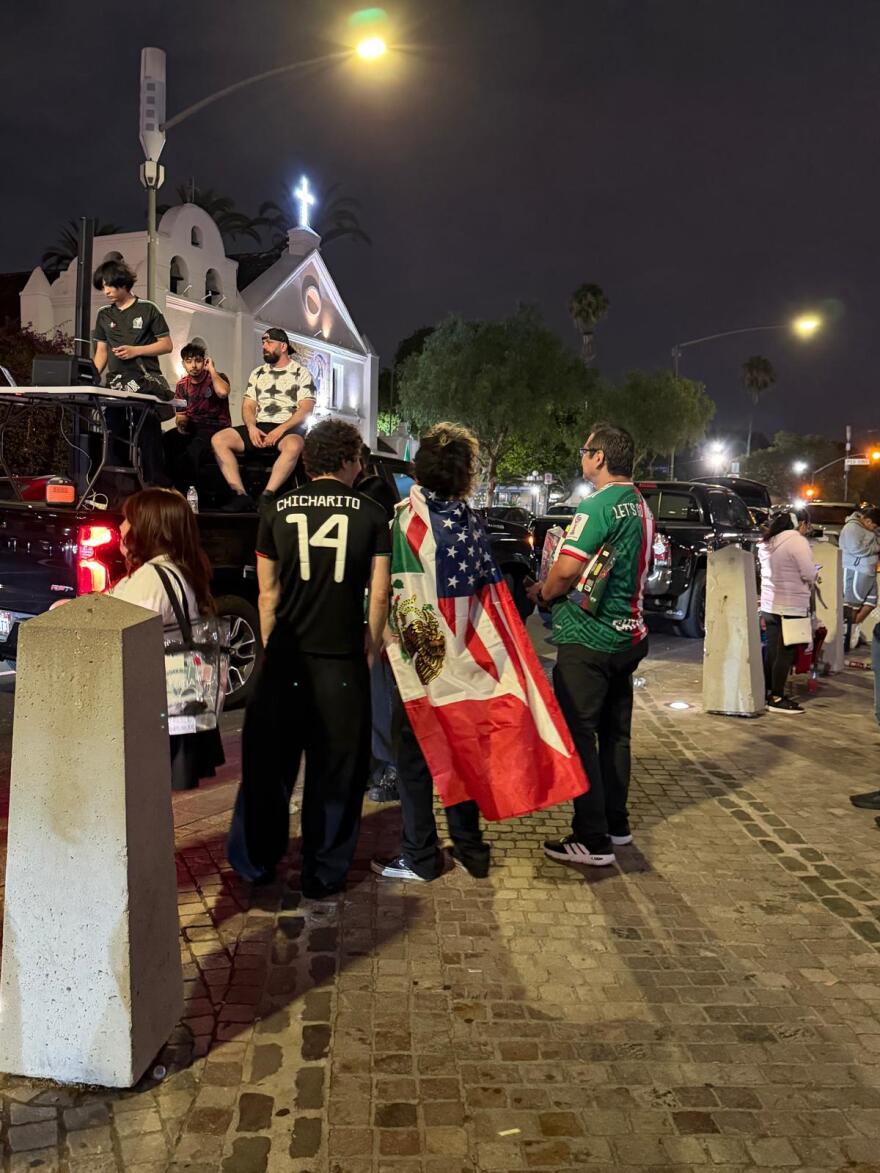Hundreds of fan, some draped in both Mexican and American flags gathered Plaza Olvera in downtown Los Angeles to celebrate Mexico's victory over Ecuador.