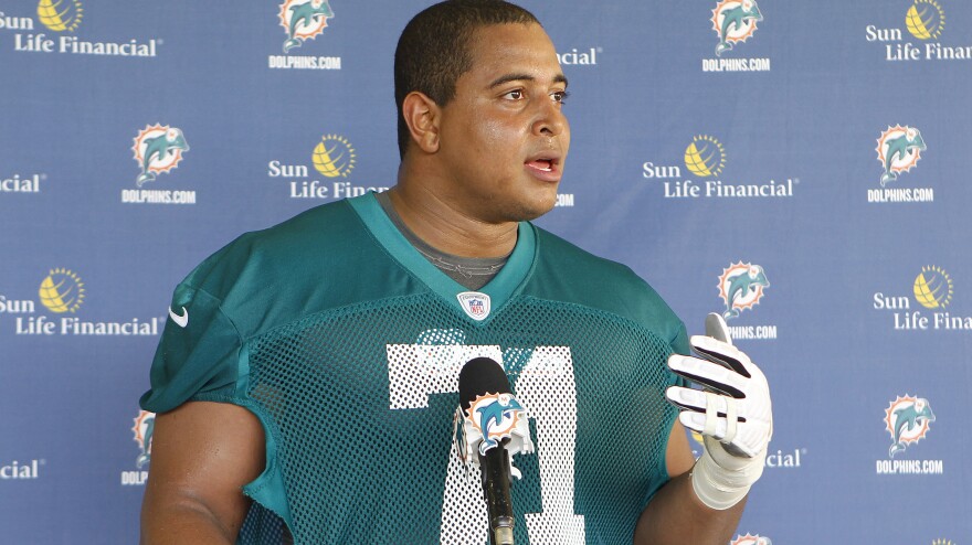 Jonathan Martin, seen here during an NFL rookies' camp in 2012, allegedly received threatening texts and voice mails from teammate Richie Incognito that included racial slurs.