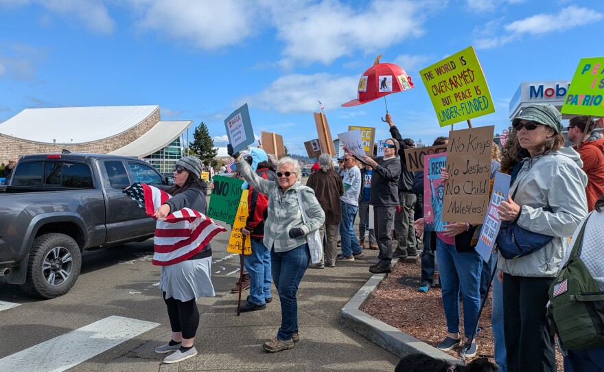 Demonstrators gather on Marine Drive in Astoria, Ore., on Saturday, March 28, 2026, for the “No Kings” protest.