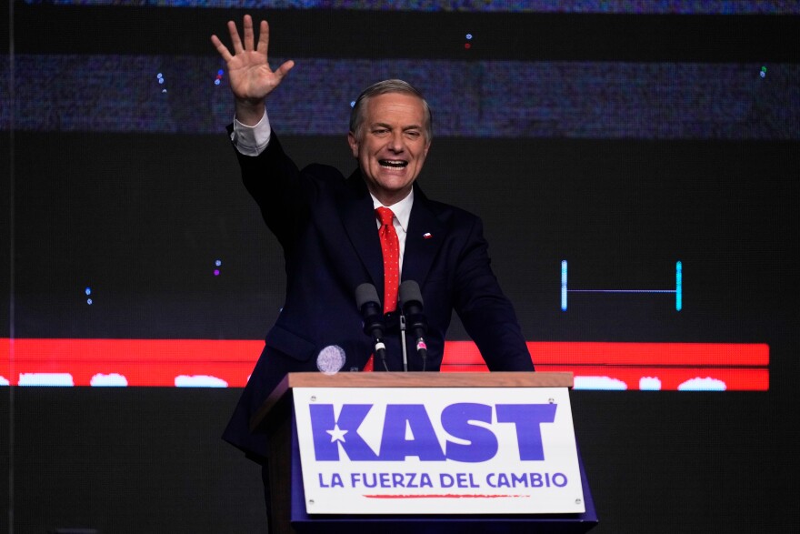 Presidential candidate Jose Antonio Kast of the Republican Party, waves to supporters after early results in the general elections in Santiago, Chile, Sunday, Nov. 16, 2025. (AP Photo/Esteban Felix)