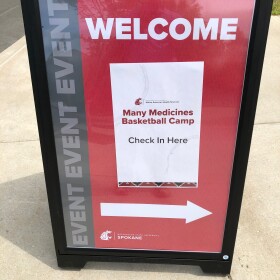 A sign points to the Many Medicines basketball camp on the WSU Spokane campus.