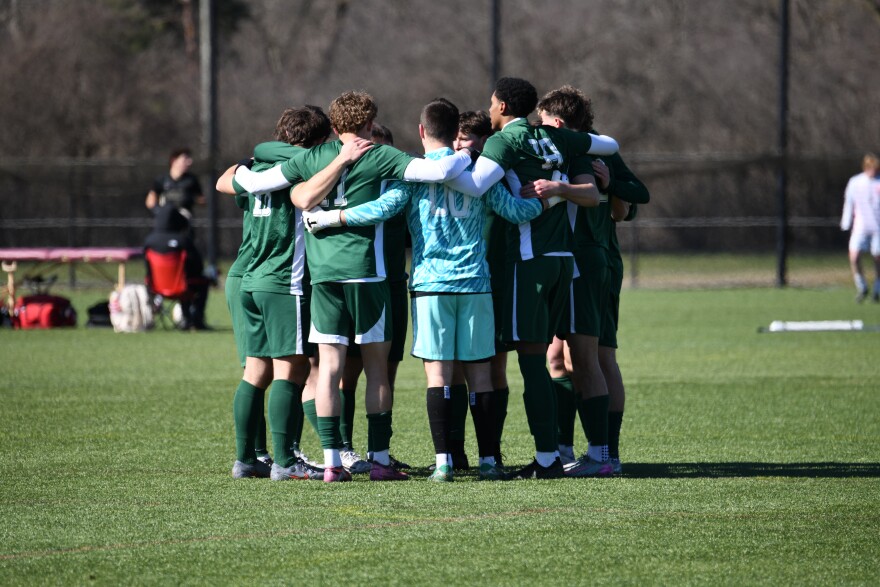 Team’s starting group huddled before game against IU Indy.