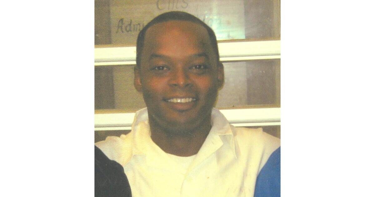 Photo: wbhm.org Headshot of Toforest Johnson in a blue and white shirt