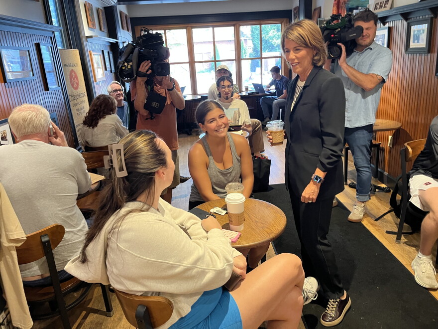 Helena Foulkes talks to patrons at Coffee Exchange in Providence the morning after her primary win. Credit: Ian Donnis/Ocean State Media