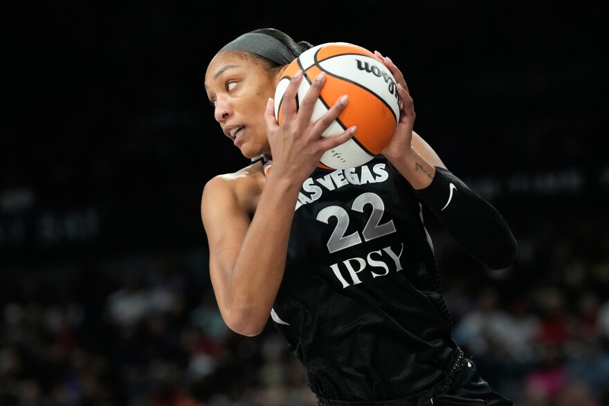 Las Vegas Aces center A'ja Wilson (22) plays against the Golden State Valkyries in a WNBA basketball game Sunday, June 21, 2026, in Las Vegas. (AP Photo/John Locher)