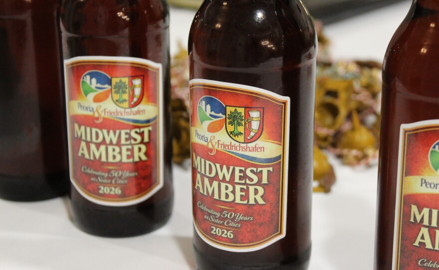 A specially brewed Midwest Amber ale with a custom label celebrating 50 years of the Peoria-Friedrichshafen sister city partnership was among the gifts given to guests at Thursday's anniversary dinner.