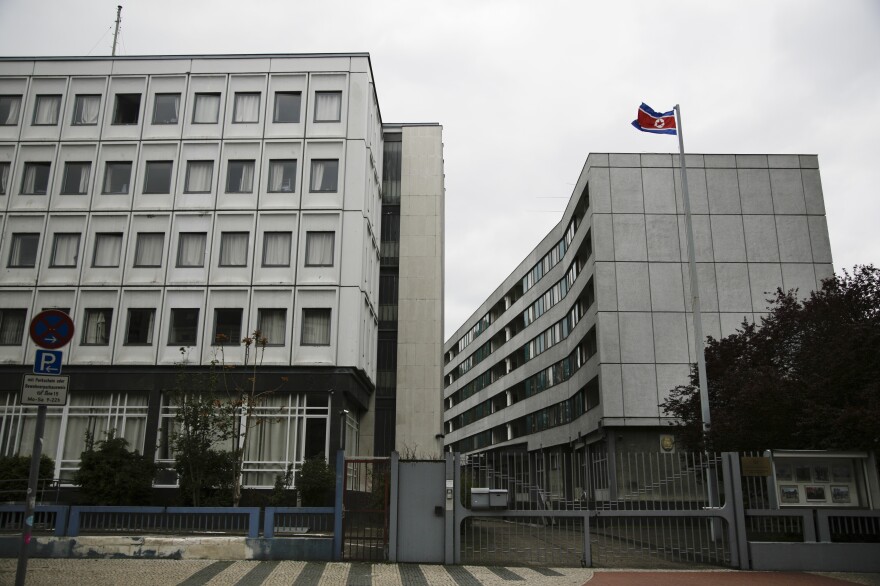 The hostel, left, is next door to the North Korean embassy. The hostel's ownership isn't necessarily clear to the backpackers who stay there.
