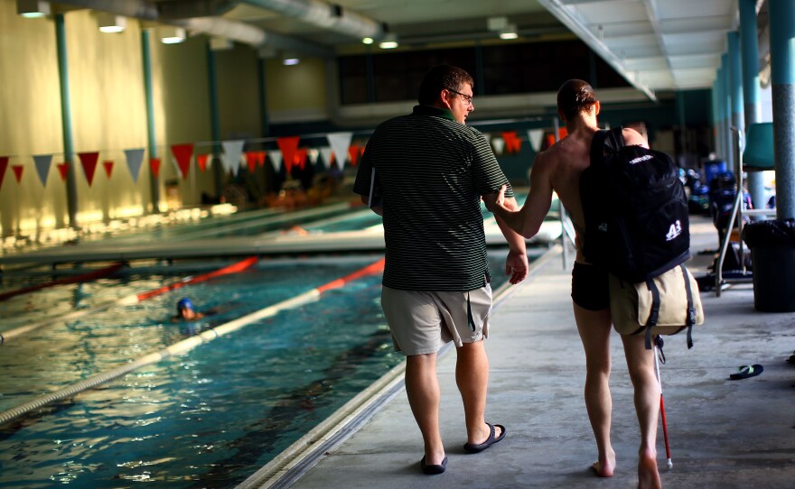 Synder and Loeffler head to the showers after training.