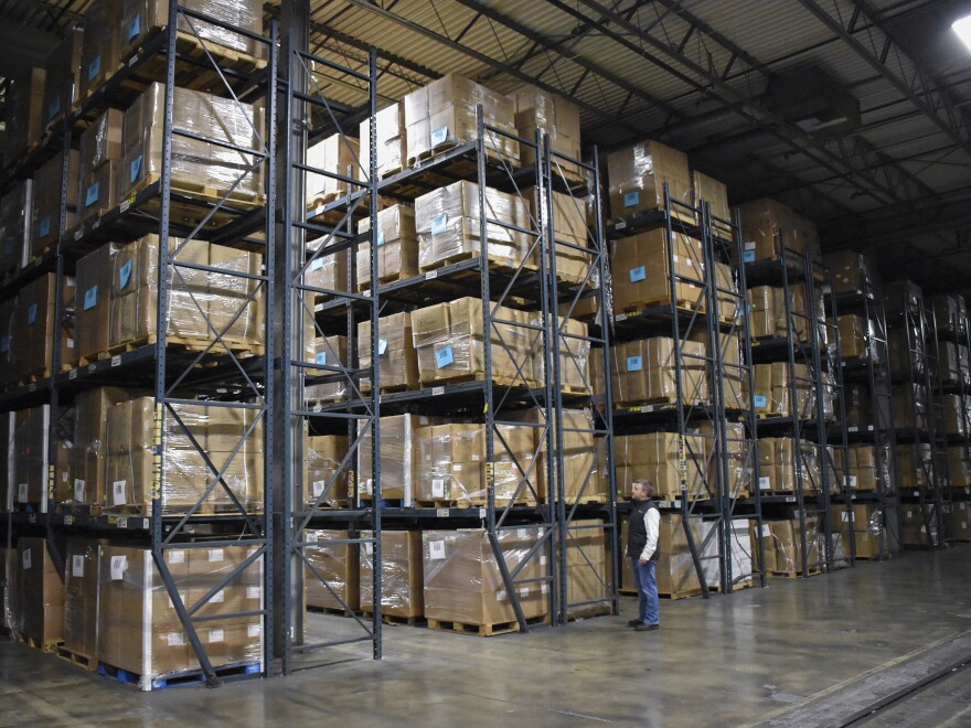 Boxes of personal protection equipment maintained by the Missouri Department of Health and Senior Services are shown stacked in a warehouse in Jefferson City, Mo., on Dec. 1, 2023.