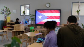 A Puerto Rican flag is displayed on a screen in a classroom at the John Cardinal O’Connor Center for Parent and Child Development, a Head Start center operated by The New York Foundling, in San Juan, Puerto Rico, Tuesday, Oct. 13, 2026.
