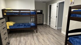 Beds in a housing unit with Optimal Living Services