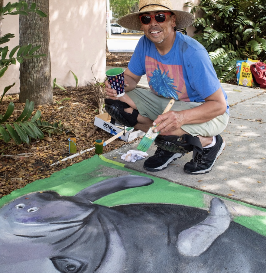 Randall Segura filed a claim for the two squares he painted, including one of a manatee. A Colorado resident, Segura joined the project when he was invited to stay on for a few days after participating in the Chalk Festival. He was offered a stipend of $100 a panel.
