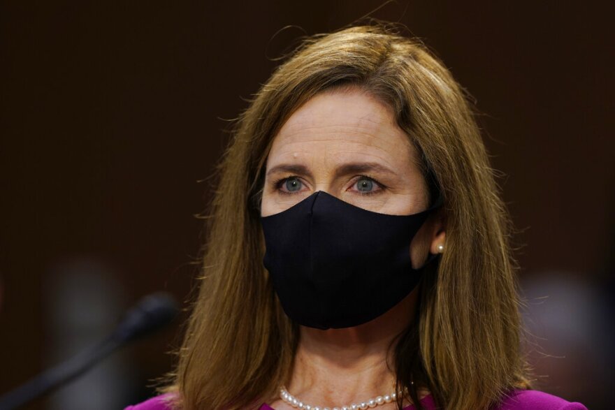 Supreme Court nominee Amy Coney Barrett arrives for her confirmation hearing before the Senate Judiciary Committee Oct. 12.
