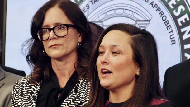 House Minority Leader Cyndi Munson, D-Oklahoma City, speaks while Senate Minority Leader Julia Kirt, D-Oklahoma City, listens at a news conference March 31, 2025, at the state Capitol in Oklahoma City.