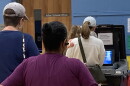 Voters wait to cast their ballot at the Ivy precinct in Albemarle County.