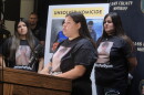 Monica Oothoudt, 27, pleads for answers about the death of her cousin, 17-year-old Dylon Oothoudt, at a press conference in Cass Lake on Oct. 7, 2026. Standing behind her are Dylon's cousin, Dalyla Oothoudt, and his sister, Rosa Oothoudt.