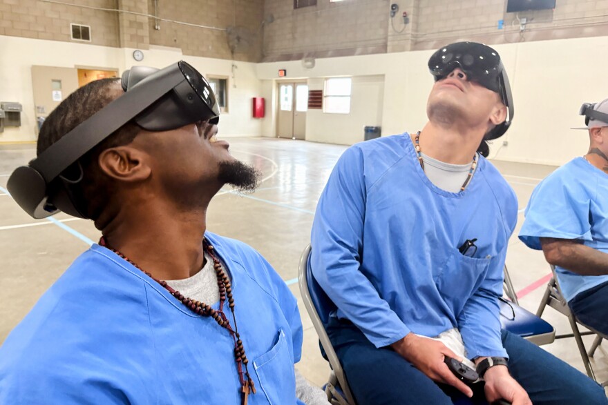 Incarcerated men use virtual reality headsets inside Valley State Prison in Chowchilla, Calif., Dec. 11, 2025.