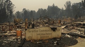 A sign stands at a community destroyed by the Camp fire, Tuesday, Nov. 13, 2018, in Paradise, Calif. (John Locher/AP)