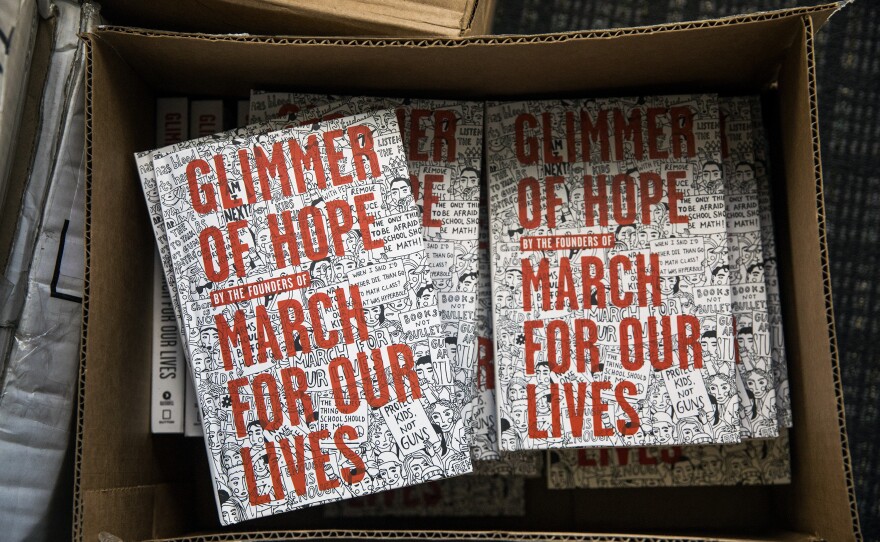 Boxes of books for sale at the March for Our Lives office. The movement is planning to take time away from social media on the anniversary and the days immediately following it.