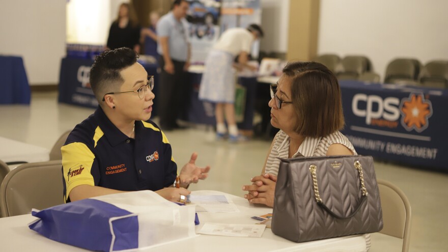 CPS Energy employee offers assistance to customers during a recent community fair