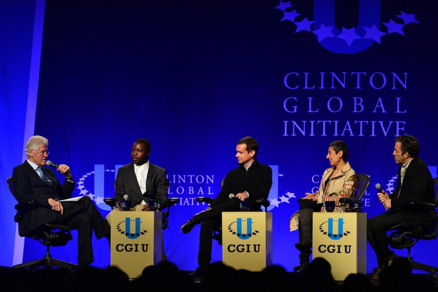 Bill Clinton, former President of the United States, leads a panel discussion including William Kamkwamda, Zainab Salbi, Jack Dorsey and Kenneth Cole during opening plenary of the Clinton Global Initiative University on the campus of Washington University