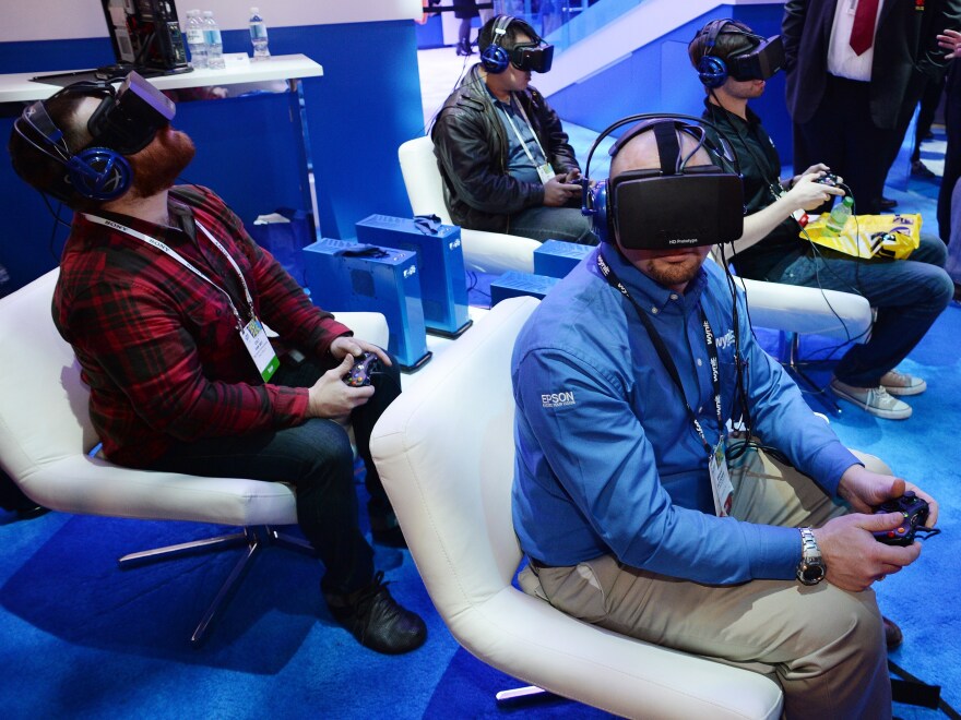 Attendees wear Oculus Rift HD virtual reality headsets at the Consumer Electronics Show in January.