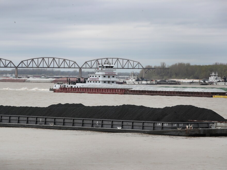 A barge loaded with Illinois Basin coal sits in the Ohio River in Cairo, Ill.