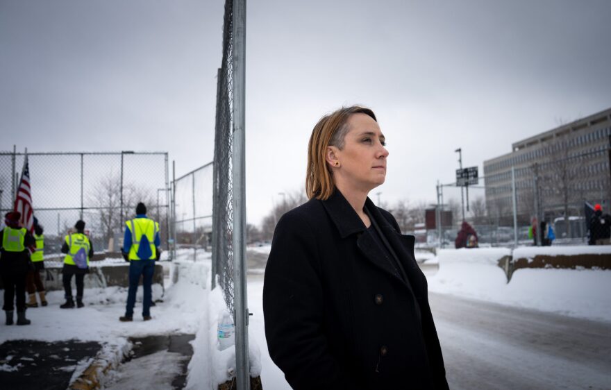 Attorney M Boulette stands outside the Bishop Henry Whipple Federal Building, where many people detained by ICE are held, on Feb. 19, 2026.