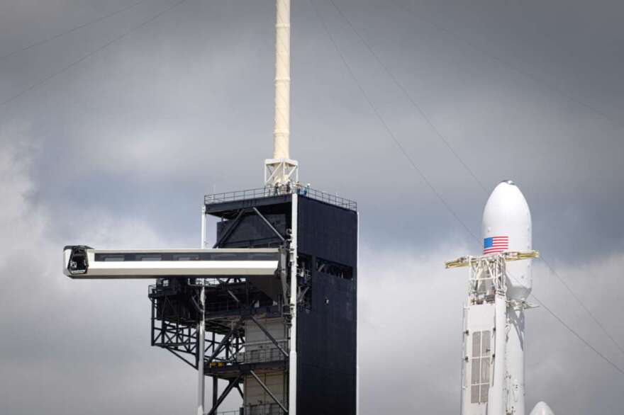 SpaceX's Falcon Heavy carrying Arabsat-6A stands ready for launch at Kennedy Space Center. Photo: Brendan Byrne / WMFE