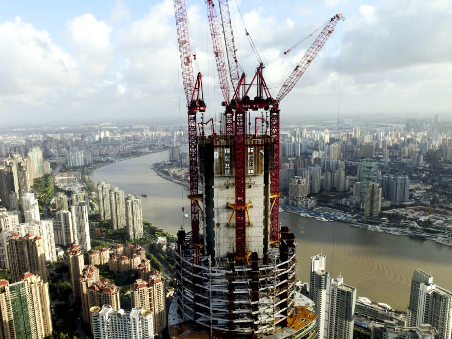 China's growing economic might means that it has increasing power to push back against US policies that it does not like, according to analysts. This photo from August shows the construction on the Shanghai Tower, which will be the tallest building in Shanghai.