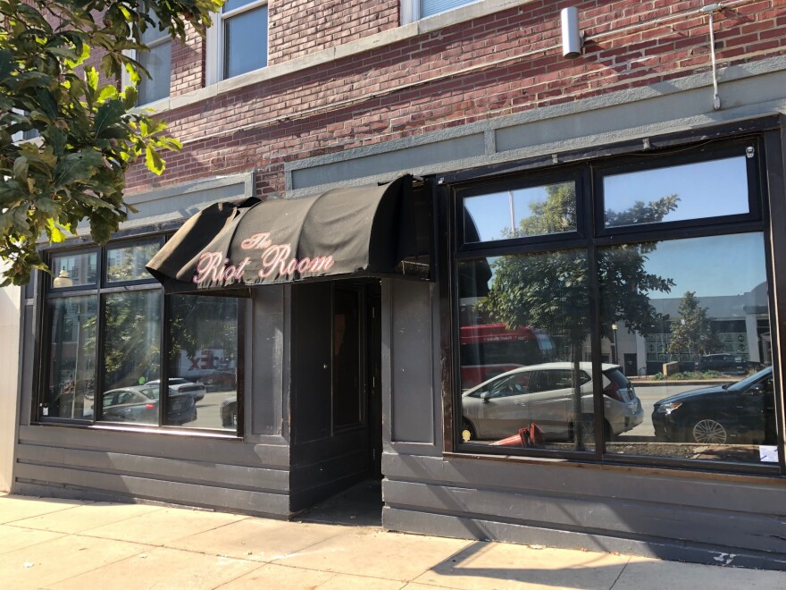 The Riot Room in Westport closed on Friday. On Monday, windows were covered by black trash bags.