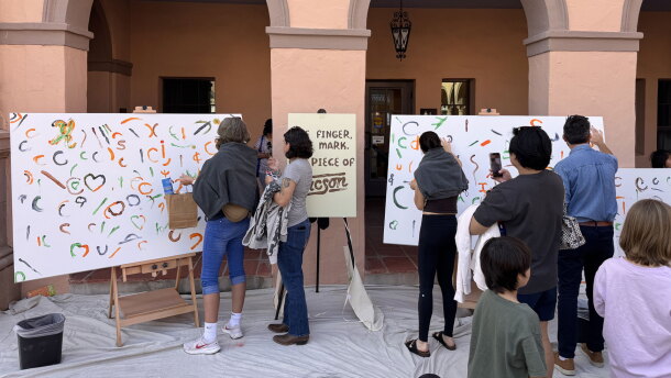 Local tucsonans paints on canvases during Tucson Meet Yourself at the historic Pima County Courthouse on Oct. 17, 2026.