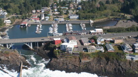 City leaders in Depoe Bay are anxiously awaiting word if silt accumulating at the south side (image right) of their harbor will be dredged in 2019.