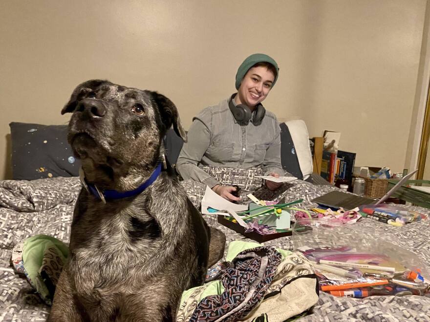 Mimi Newman, pictured with her dog Miller, has lived in isolation for a year to avoid COVID-19. She says California's vaccine distribution strategy should have prioritized people with disabilities.