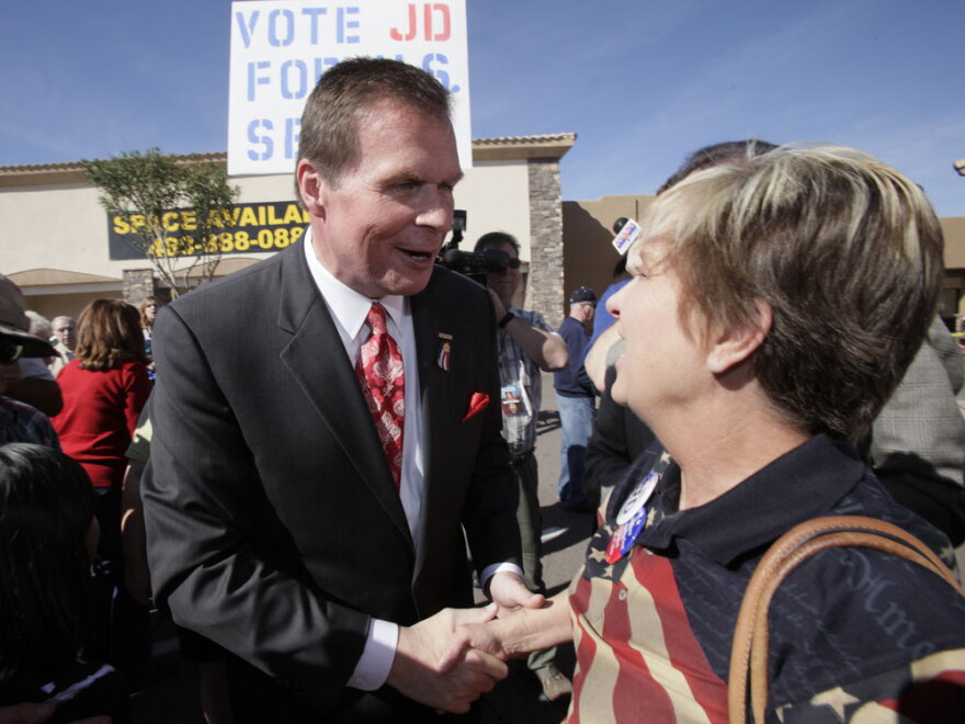 Former Republican Rep. J.D. Hayworth shakes hands with supporters as he kicks off his campaign to challenge Arizona Republican Sen. John McCain at a campaign rally Feb. 15.
