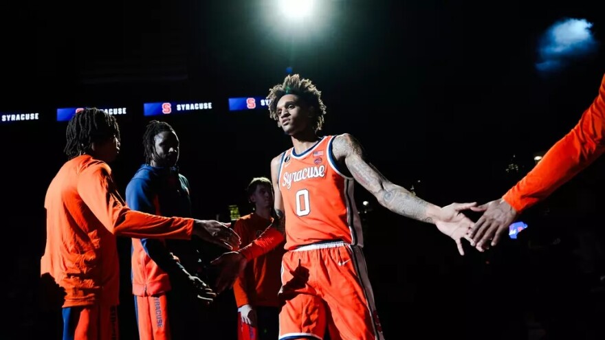 Forward Sadiq White (0, Orange) enters before Tuesday’s game against Kansas