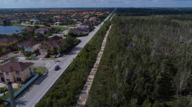 Miami-Dade County transportation planners want to extend the Dolphin Expressway beyond the urban boundary shown here along Southwest 157th Avenue.