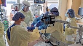 An ICU team at Asante Rogue Regional Medical Center preparing to intubate a crashing COVID-19 patient. (Michael Blumhardt/Asante)