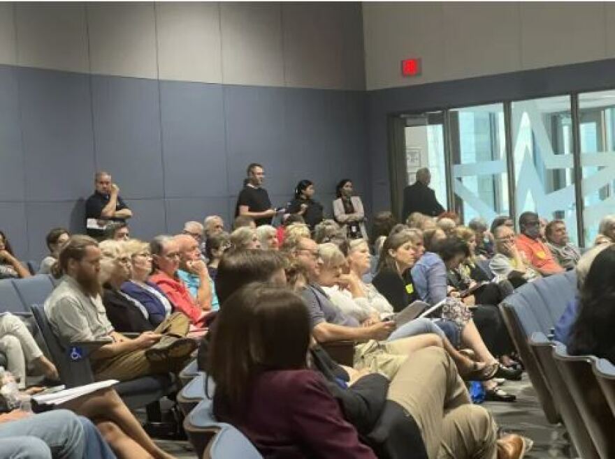 Dozens of supporters and opponents of Total Energines’ proposal to drill two new wells in southeast Arlington filled Arlington City Hall on May 23, 2023. Total operates as TEP Barnett in North Texas.